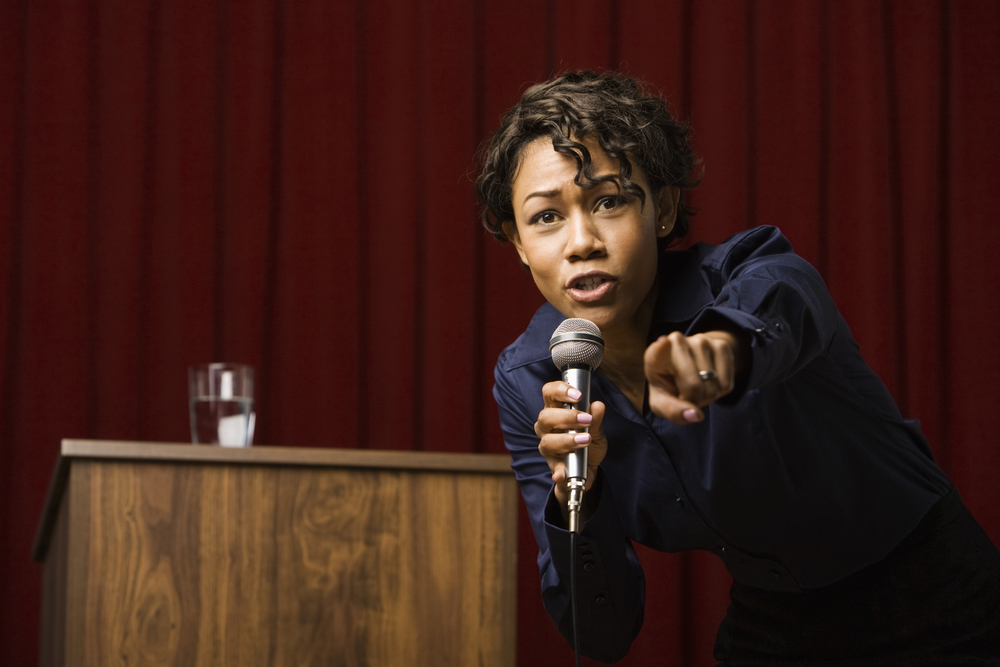 woman persuading audience